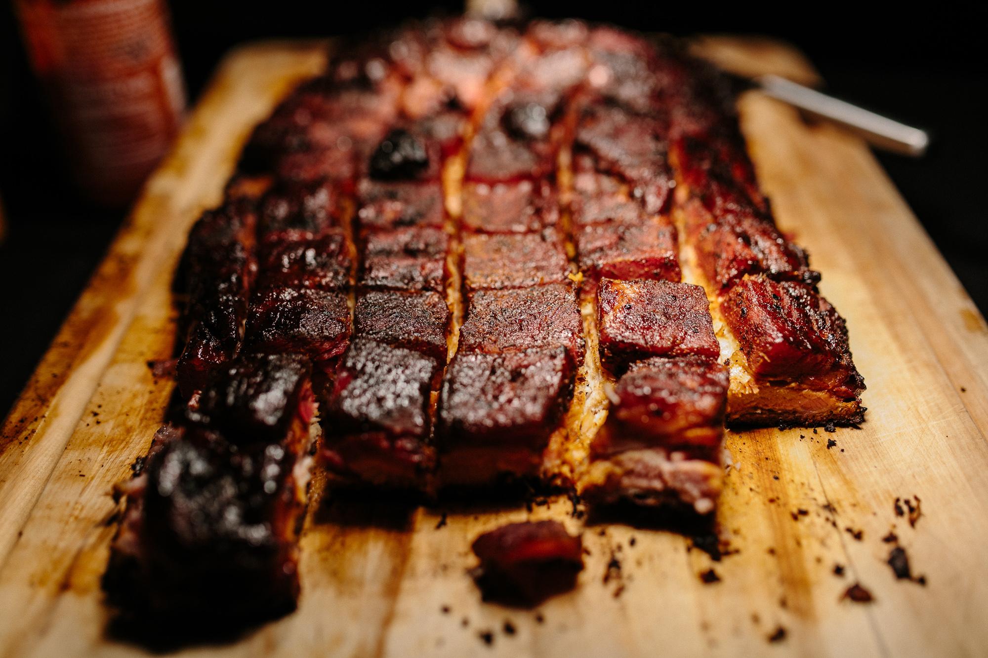 Smoked bacon slab prepared for the Bourbon & Bacon Social food and bourbon tasting event at The Meadow Barn