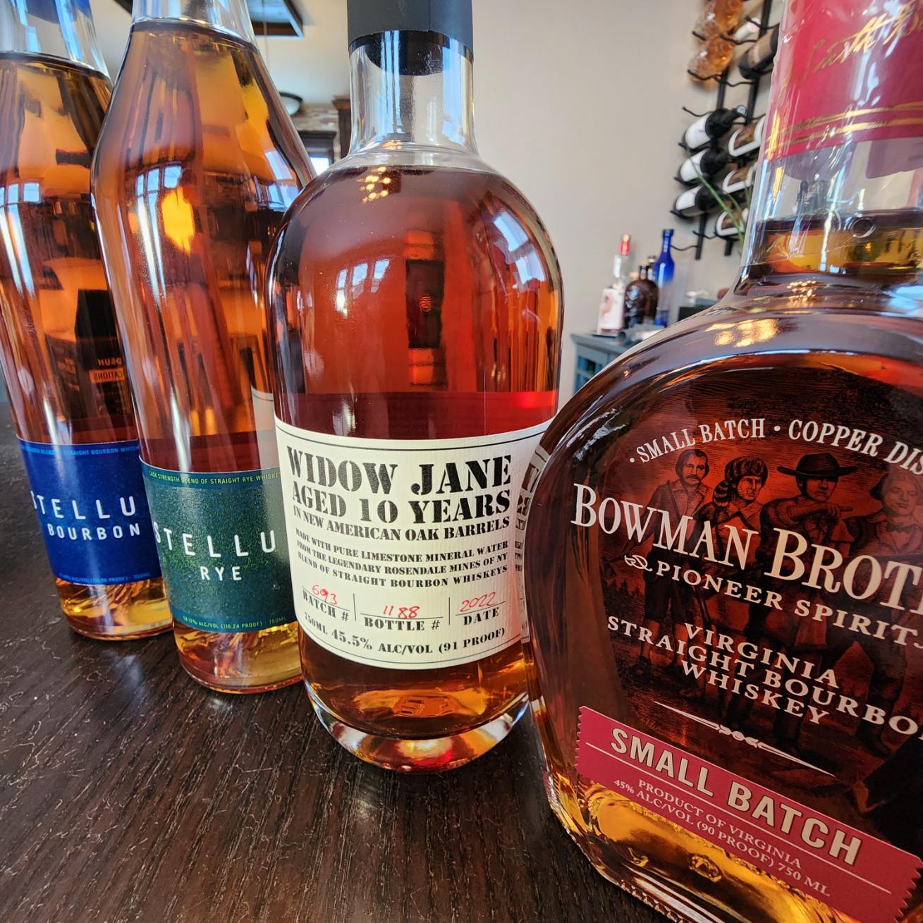 Premium bourbon bottles featured at the Bourbon & Bacon Social tasting event at The Meadow Barn near Sioux Falls South Dakota